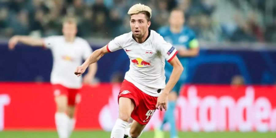 Leipzigs Kevin Kampl hat immer noch Schmerzen im operierten Sprunggelenk. Foto: Jan Woitas/dpa-Zentralbild/dpa
