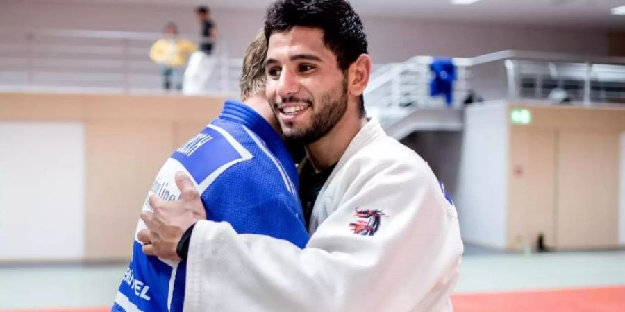Ist in Tokio ausgeschieden: Fares Badawi (r). Foto: Hauke-Christian Dittrich