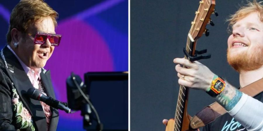 Sir Elton John (l) und Ed Sheeran sind gemeinsam ins Rennen um den Weihnachtshit des Jahres gegangen. Foto: Valentin Flauraud/Ricardo Rubio/KEYSTONE/Europa Press/dpa