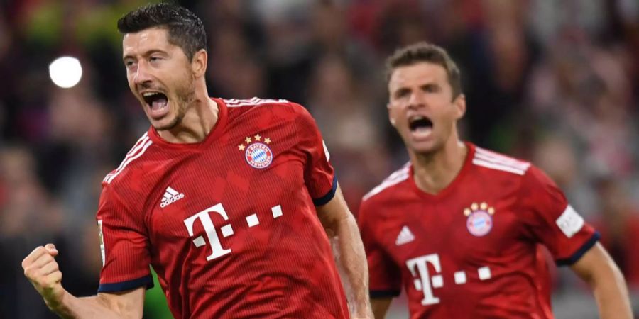 Robert Lewandowski und Thomas Müller jubeln über den Sieg gegen Hoffenheim.