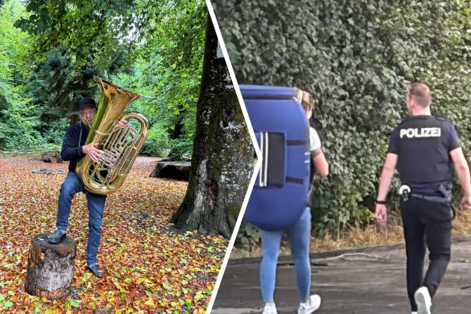 Konzertende: Die Kantonspolizistin trägt das 13 Kilo schwere Instrument weg - ihr Kollege bietet Geleitschutz.