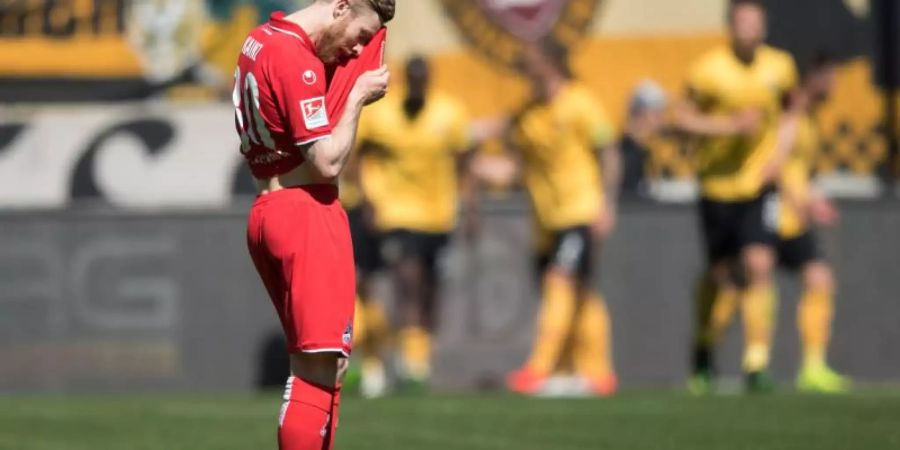 Dresdens Spieler feiern, FC-Profi Florian Kainz ist bedient. Foto: Sebastian Kahnert
