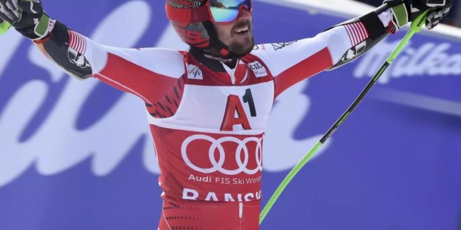 Marcel Hirscher jubelt in Bansko im Ziel. Foto: Marco Tacca/AP