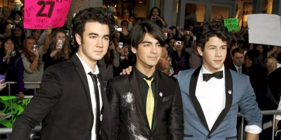 Kevin (l-r), Joe und Nick Jonas (2009) wollen es noch einmal zusammen versuchen. Foto: Nina Prommer/epa