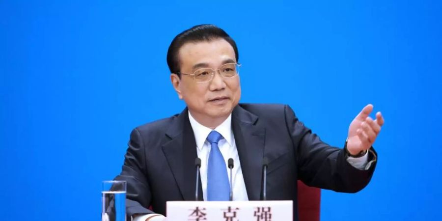 Chinas Ministerpräsident Li Keqiang: «Wir müssen sicherlich starke Massnahmen ergreifen, um mit den steigenden Unsicherheiten fertig zu werden». Foto: Xing Guangli/Xinhua