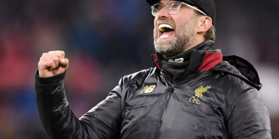 Liverpool-Trainer Jürgen Klopp jubelt nach dem Sieg beim FC Bayern. Foto: Tobias Hase