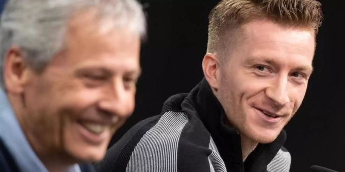 BVB-Kapitän Marco Reus und Trainer Lucien Favre wollen Fussball-Geschichte schreiben. Foto: Bernd Thissen BVB-Kapitän Marco Reus und Trainer Lucien Favre wollen Fussball-Geschichte schreiben. Foto: Bernd Thissen