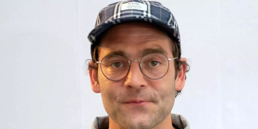 Der Sänger Axel Bosse erzählt ein bisschen von seiner Familie. Foto: Swen Pförtner/dpa