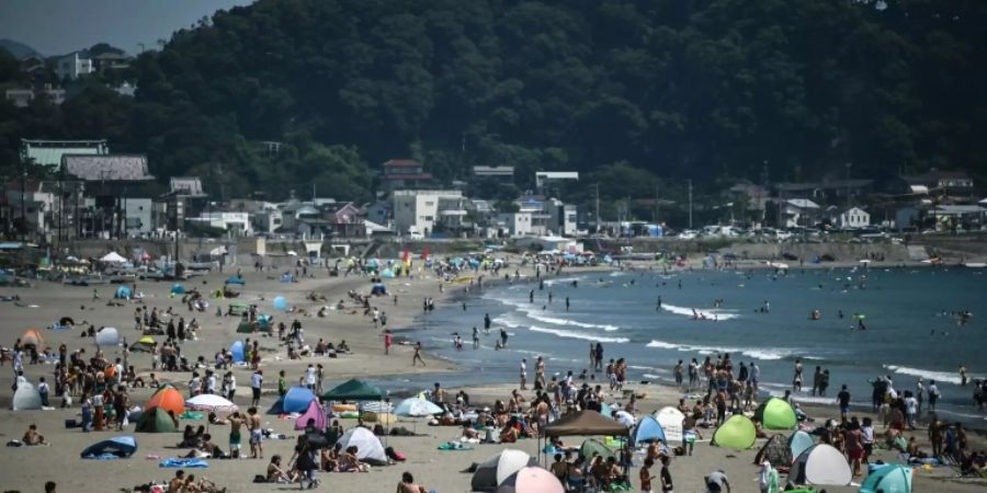 Menschen am Strand