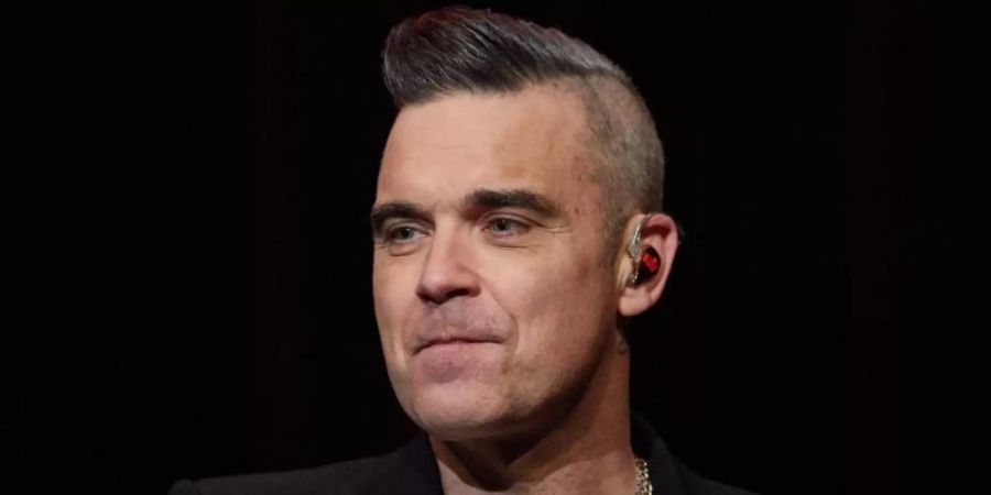 Robbie Williams über Jürgen Klopp: «Er ist mein Männerschwarm.». Foto: Georg Wendt/dpa