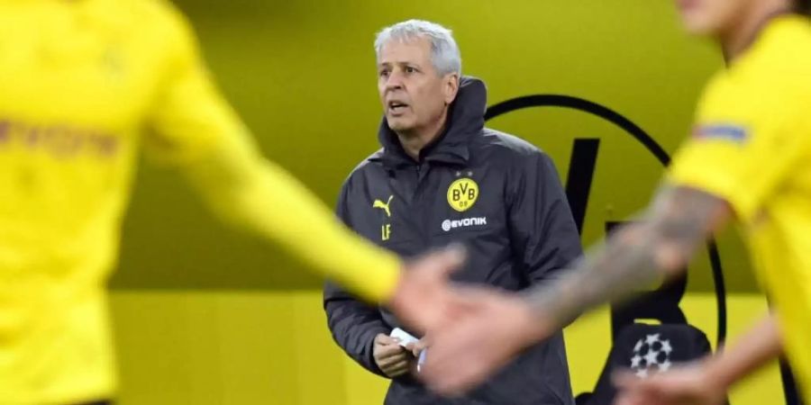 War trotz des glanzlosen Sieges sehr zufrieden: Dortmunds Trainer Lucien Favre. Foto: Bernd Thissen/dpa