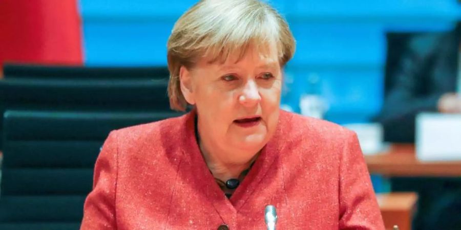 Kanzlerin Angela Merkel bezeichnet die Amtseinführung des neuen US-Präsidenten als «Feier der amerikanischen Demokratie». Foto: Fabrizio Bensch/Reuters/Pool/dpa