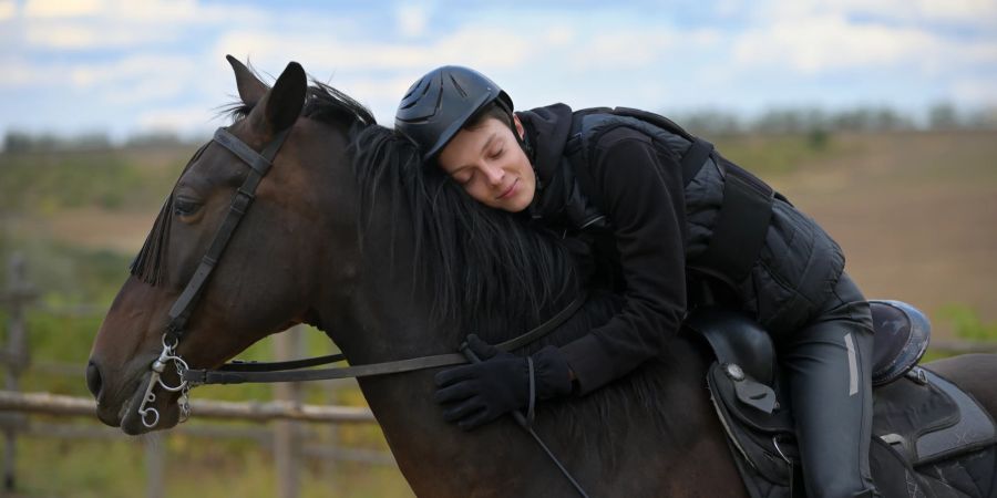 Frau auf Pferd