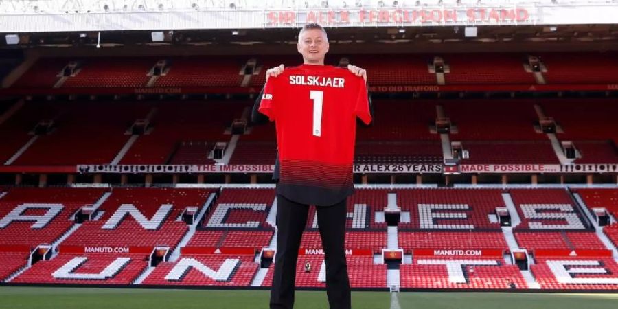 Manchester United hat seinen bisherigen Interimstrainer Ole Gunnar Solskjaer dauerhaft als Coach verpflichtet. Foto: Martin Rickett/PA Wire/dpa