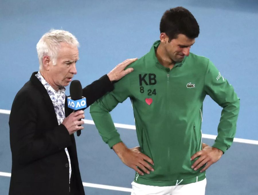 John McEnroe mit Novak Djokovic.