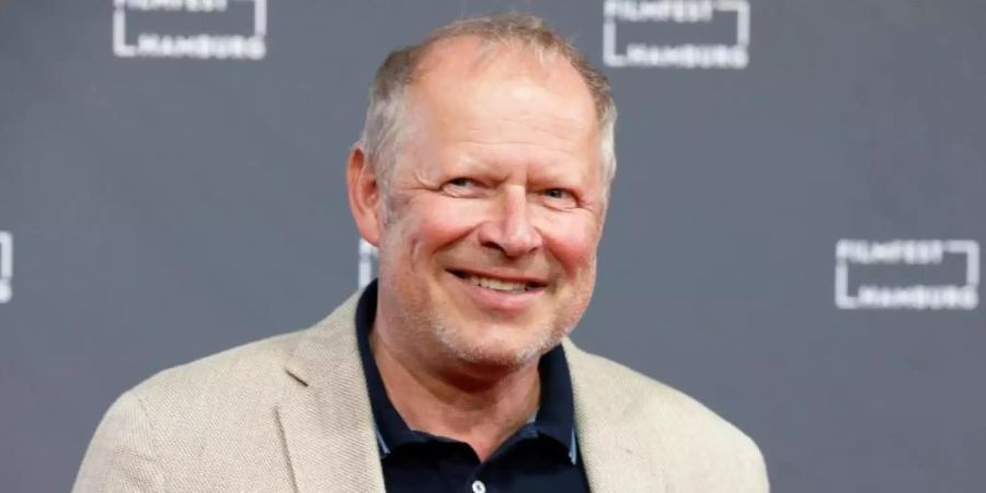 Axel Milberg wird mit dem Sonderpreis des Deutschen Hörbuchpreises geehrt. Foto: Georg Wendt/dpa