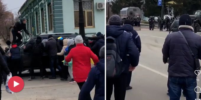 Zivile gegen Russen - Ukrainer greifen Militär-Fahrzeug ohne Waffen an
