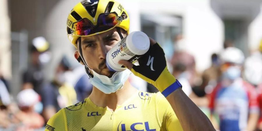 Julian Alaphilippe hatte auf der 5. Etappe innerhalb der letzten 20 Kilometer eine Trinkflasche angenommen. Foto: Pool/BELGA/dpa