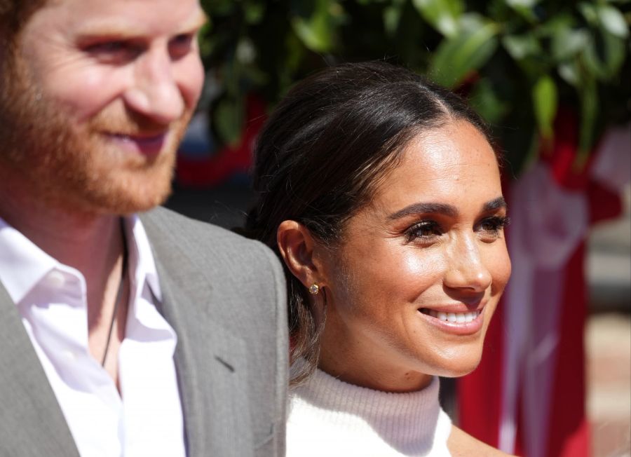 Prinz Harry und Meghan strahlten um die Wette.