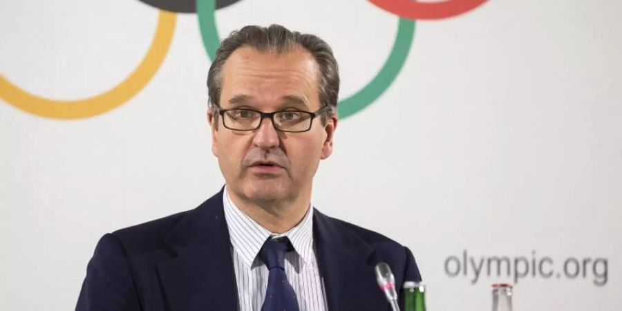 IOC-Sprecher Mark Adams spricht auf einer Pressekonferenz. Foto: Cyril Zingaro/KEYSTONE/dpa/Archivbild