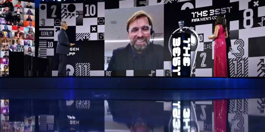 Jürgen Klopp (M.) ist FIFA-Welttrainer des Jahres. Foto: Valeriano Di Domenico/POOL FIFA/Getty/dpa