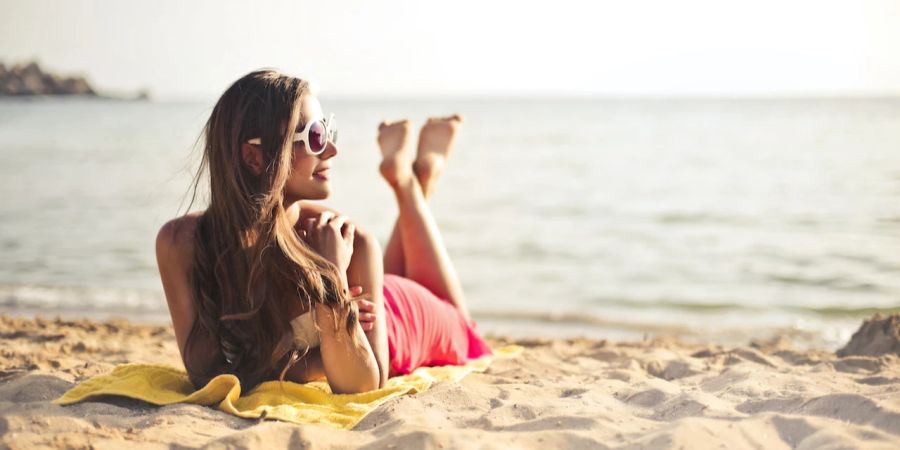 Frau am Strand