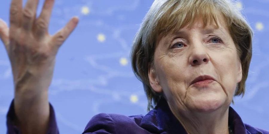 Angela Merkel hatte 2015 zusammen mit Frankreich bei den Verhandlungen zu einem Friedensplan für die Ostukraine vermittelt. (Archivbild). Foto: Olivier Hoslet/EPA/dpa