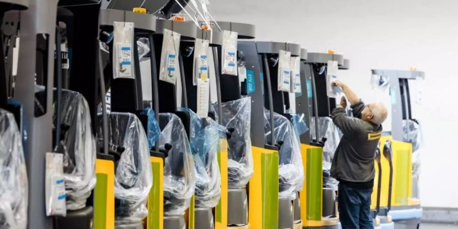 Die deutsche Wirtschaft brummt und könnte nach Ansicht von führenden Fachleuten noch in diesem Jahr wieder Vorkrisenniveau erreichen. Foto: Markus Scholz/dpa