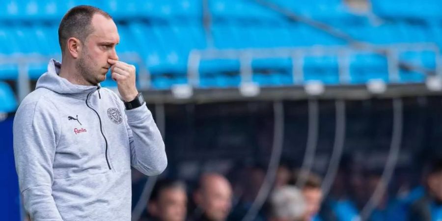 Will mit Holstein Kiel in die Bundesliga: Ole Werner. Foto: Guido Kirchner/dpa