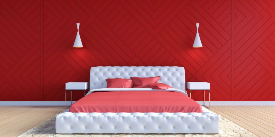 Schlafzimmereinrichtung mit roter Wand