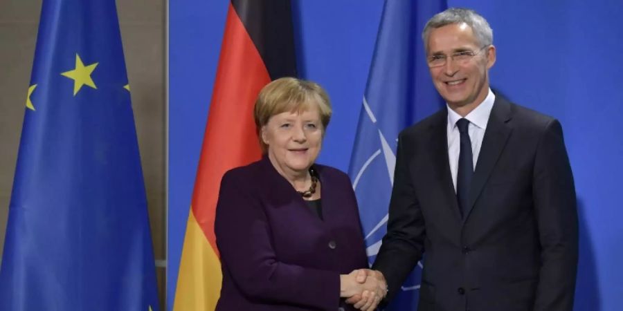 Merkel und Stoltenberg bei einem Treffen 2019