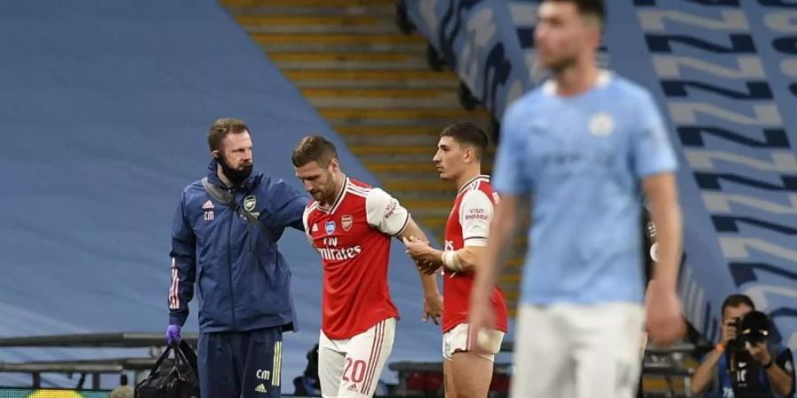 Shkodran Mustafi (2.v.l.) fällt vorerst aus. Foto: Justin Tallis/Pool AFP/AP/dpa