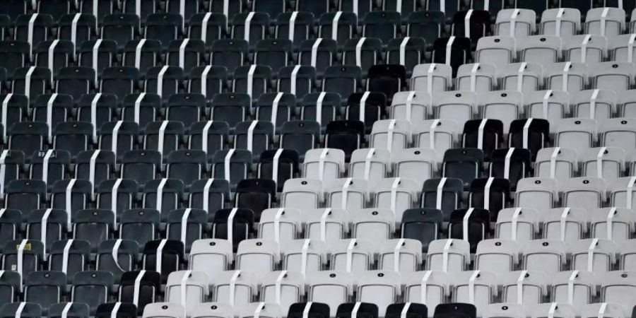 Geisterspiele werden im November wieder zum gewohnten Bild im deutschen Profi-Fussball. Foto: Marius Becker/dpa