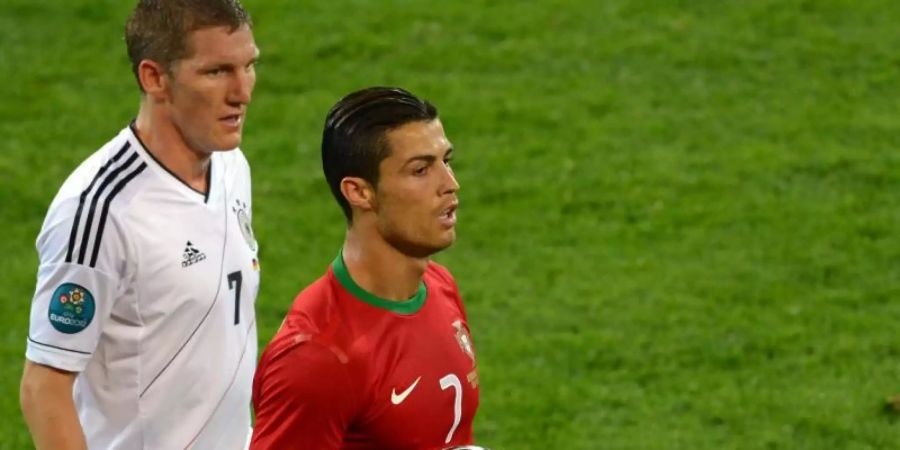 Bei der EM 2012 gewannen Bastian Schweinsteiger und Co. mit 1:0 gegen die Portugiesen um Cristiano Ronaldo. Foto: picture alliance / dpa