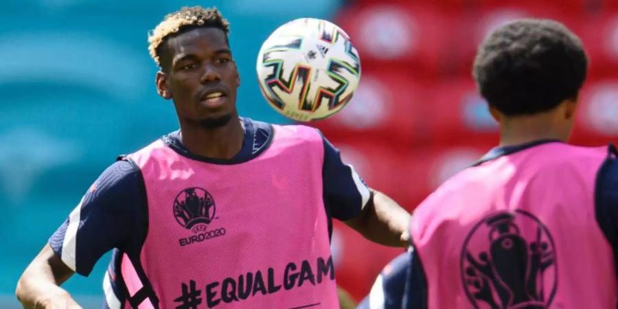 Die Franzosen um Paul Pogba (l) wollen auch gegen Ungarn gewinnen. Foto: Robert Michael/dpa-Zentralbild/dpa