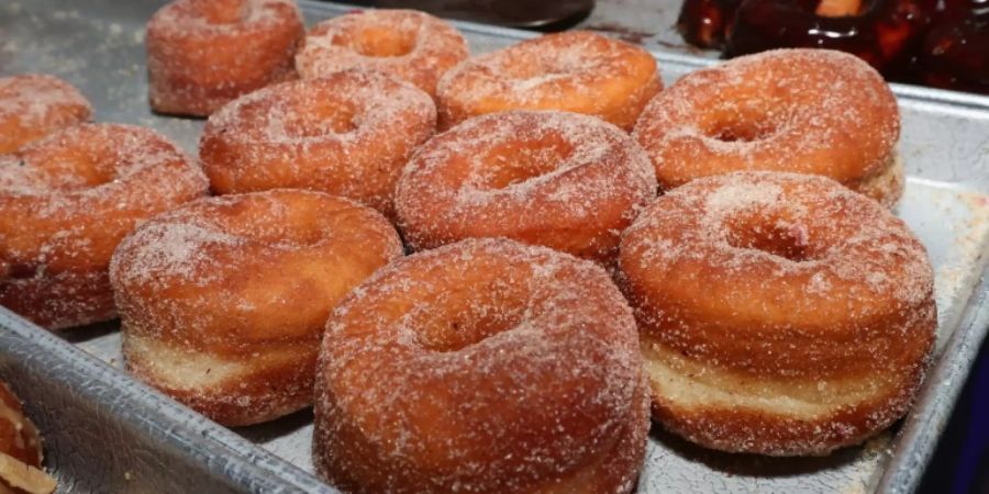 In a jam: the suspect was booked into the county jail despite offering the police donuts