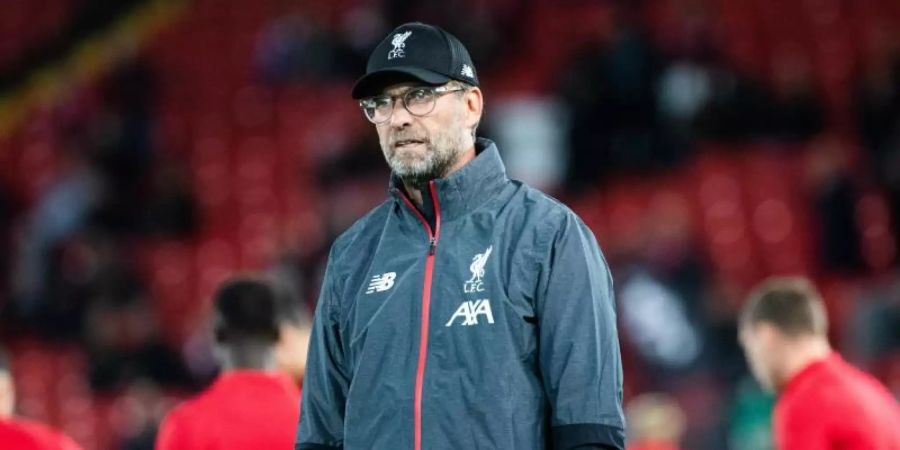 Trainer Jürgen Klopp (r) erlebte mit dem FC Liverpool ein schwieriges Spiel. Foto: Georg Hochmuth/APA/dpa