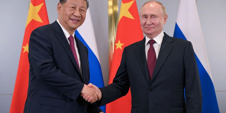 Wiedersehen in Kasachstan: Chinas Partei und Staatschef Xi Jinping und Kremlchef Wladimir Putin wollen nach ihrem Treffen im Mai in Pekin nun in Astana das Profil der Shanghaier Organisation für Zusammenarbeit schärfen.