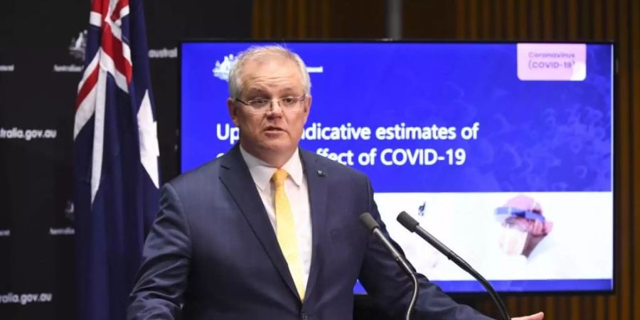 Australiens Premier Scott Morrison während einer Pressekonferenz zu den Auswirkungen der Krise. Foto: Lukas Coch/AAP/dpa