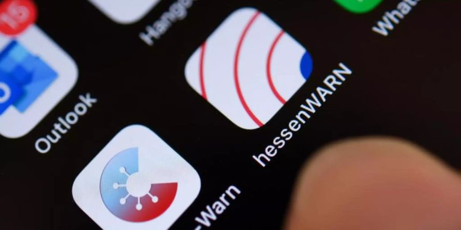Technische Probleme mit der Corona-Warn-App treten auch bei iPhones auf. Foto: Arne Dedert/dpa