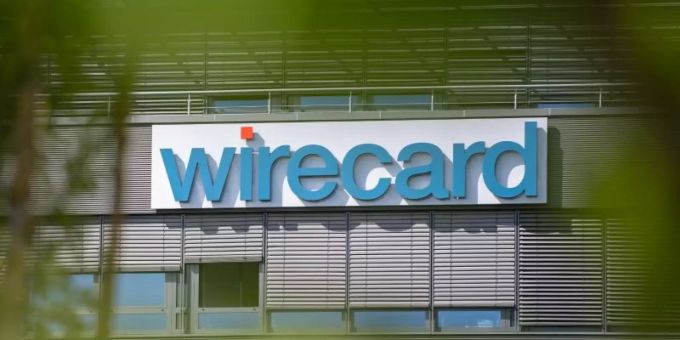 Der Wirecard-Schriftzug am Hauptquartier des Unternehmens in Bayern. Foto: Peter Kneffel/dpa wirecard