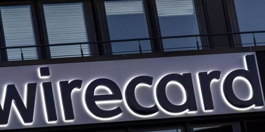 Der Schriftzug von Wirecard. Bei der Aufarbeitung des Skandals um den Zahlungsdienstleister haben das Finanzministerium und die Anti-Geldwäsche-Einheit des Bundes (FIU) neue Vorwürfe über Versäumnisse entschieden zurückgewiesen. Foto: Peter Kneffel/dpa
