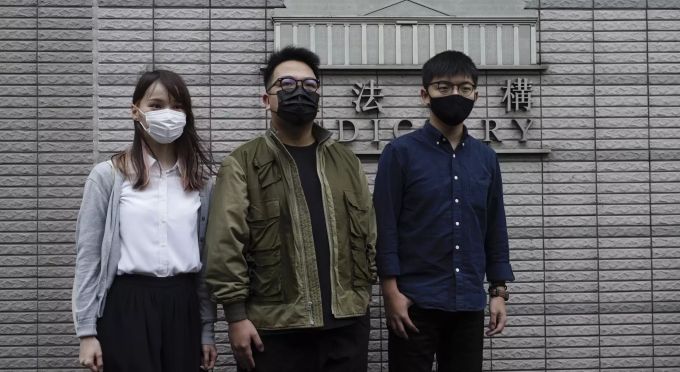 Hong Kong Aktivisten: Joshua Wong (r), Ivan Lam (m) and Agnes Chow (l). Joshua Wong