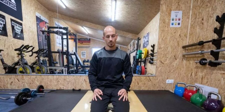 Ringer Frank Stäbler bereitet sich nach seiner Covid-19-Erkrankung unter anderem mit einer Atemtherapie auf die Tokio-Spiele vor. Foto: Marijan Murat/dpa
