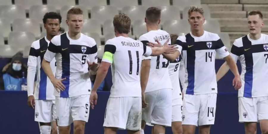 Underdog Finnland gewann überraschend bei Weltmeister Frankreich. Foto: Michel Euler/AP/dpa