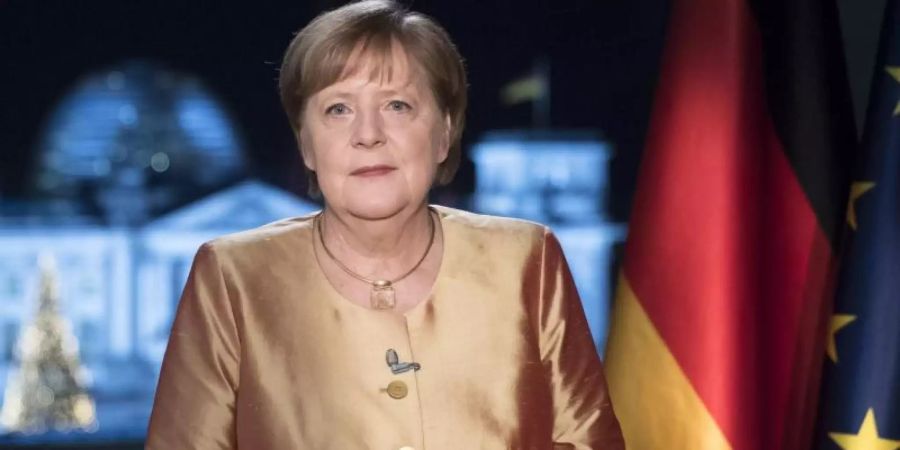 Bundeskanzlerin Angela Merkel bei ihrer jährlichen Neujahrsansprache. Foto: Markus Schreiber/AP/Pool/dpa