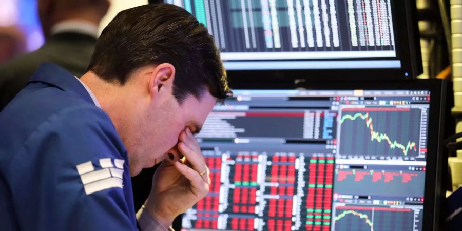 ein Mitarbeiter an der Börse.