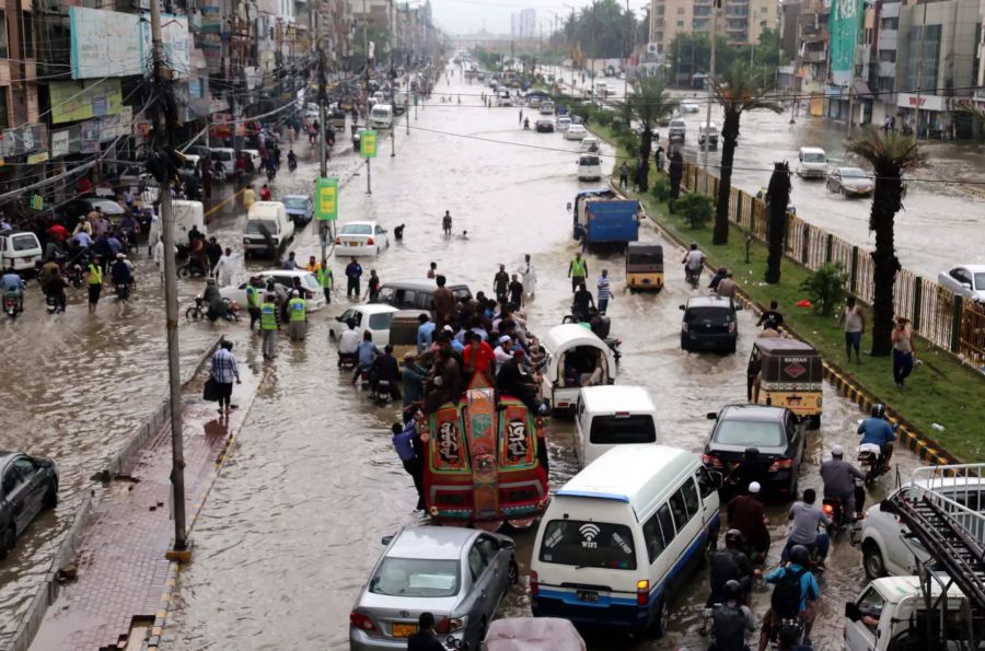 Monsoon rains flood streets of Karachi