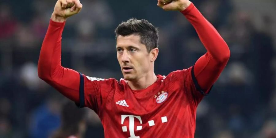 Hat gegen Wolfsburg oft Grund zum Jubel: Bayern-Torjäger Robert Lewandowski. Foto: Ina Fassbender