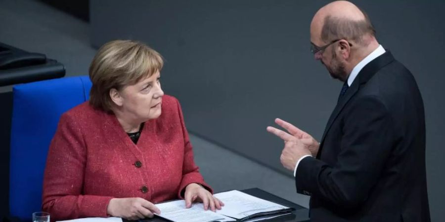 Angela Merkel und Martin Schulz Ende 2018. Beide werden den neuen Bundestag nicht mehr angehören. Foto: Bernd von Jutrczenka/dpa